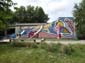 Graffeur allongé