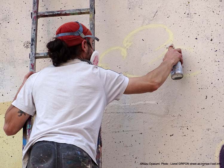 Graffeur et poissons